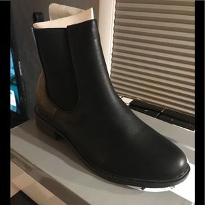 Brand new black faux leather boot